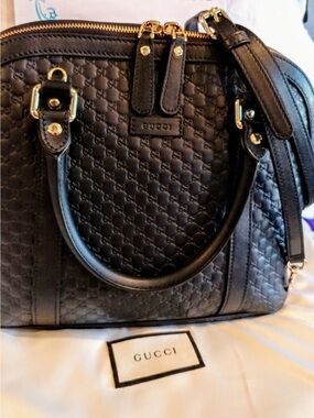 Gucci Black Embossed GG Leather Satchel with Gold Hardware